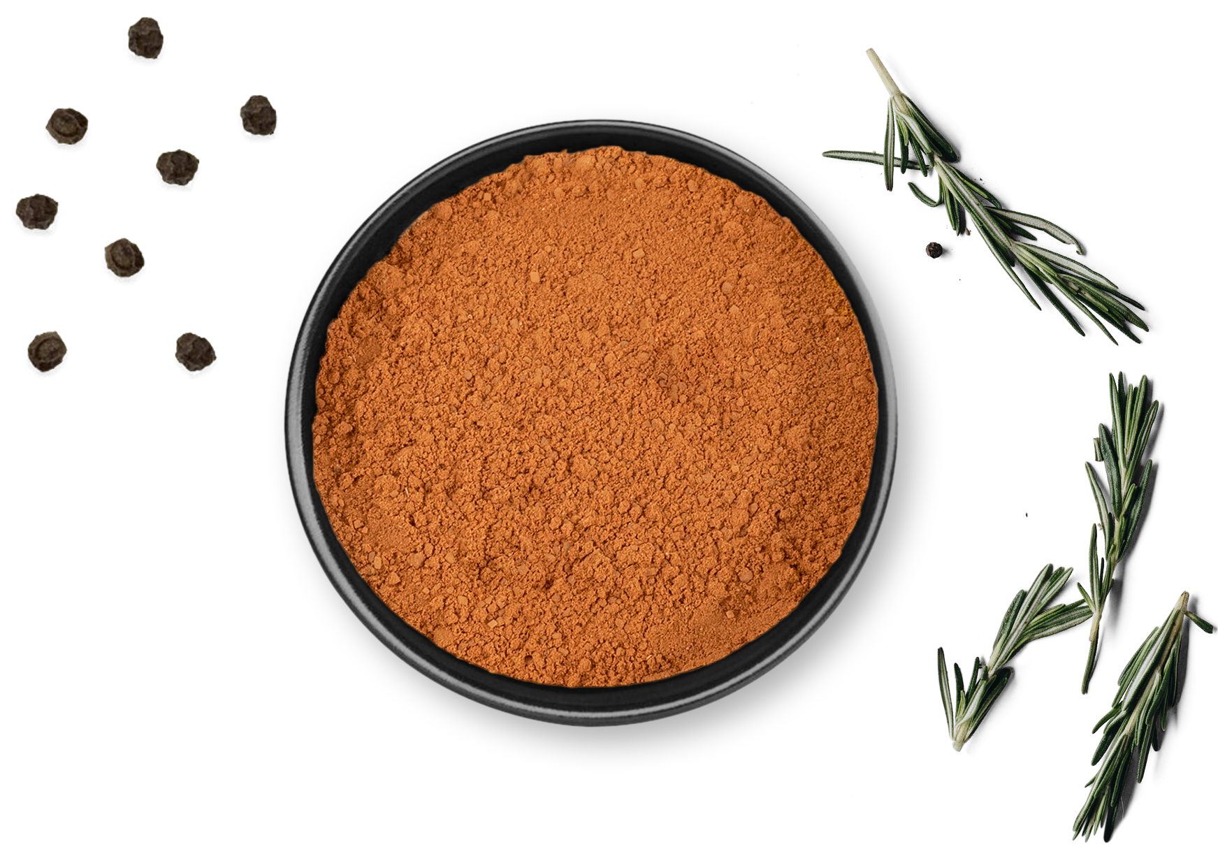 Dose CHOCO MANIA von Rosemary & Co, daneben schwarze Pfefferkörner, Rosmarinzweige, Knoblauchzehe
