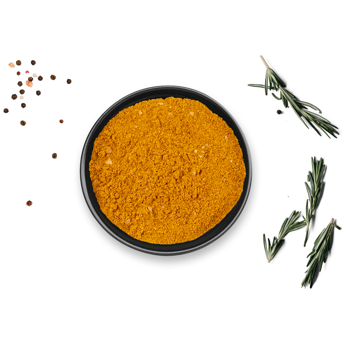 Bio Curry Mischung Dose von Rosemary & Co neben Rosmarin und Pfefferkörnern auf dunkler Oberfläche