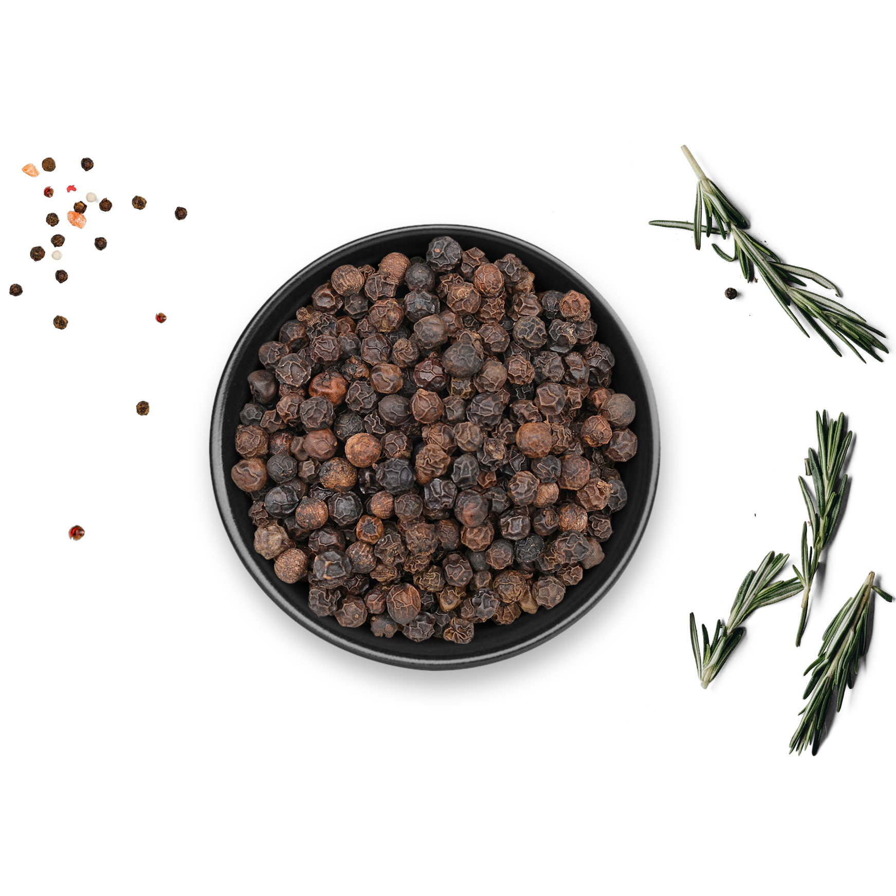 Schwarze Dose mit ganzen Rauchpfefferkörnern, daneben lose Pfefferkörner und Rosmarinzweige