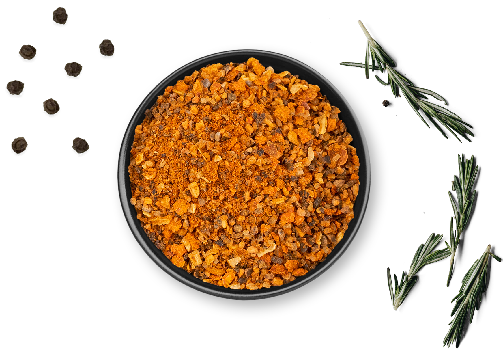 Schwarze Schale mit Rosemary & Co. Gewürze Smoky BBQ neben Pfefferkörnern, Knoblauch und Rosmarinzweigen