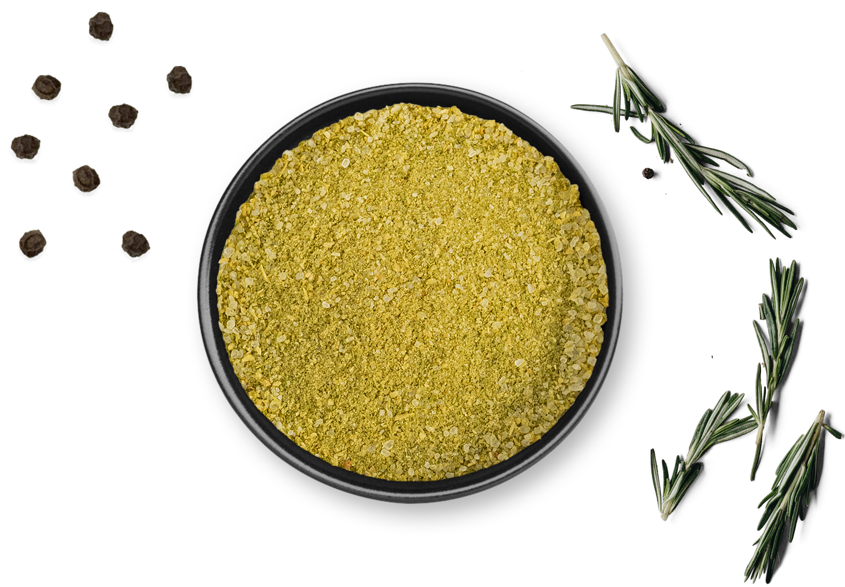 Schale mit Rosemary & Co. Gewürze Suppenkasper neben Dose schwarzem Pfefferkörner, Knoblauch und Rosmarin auf weißer Fläche